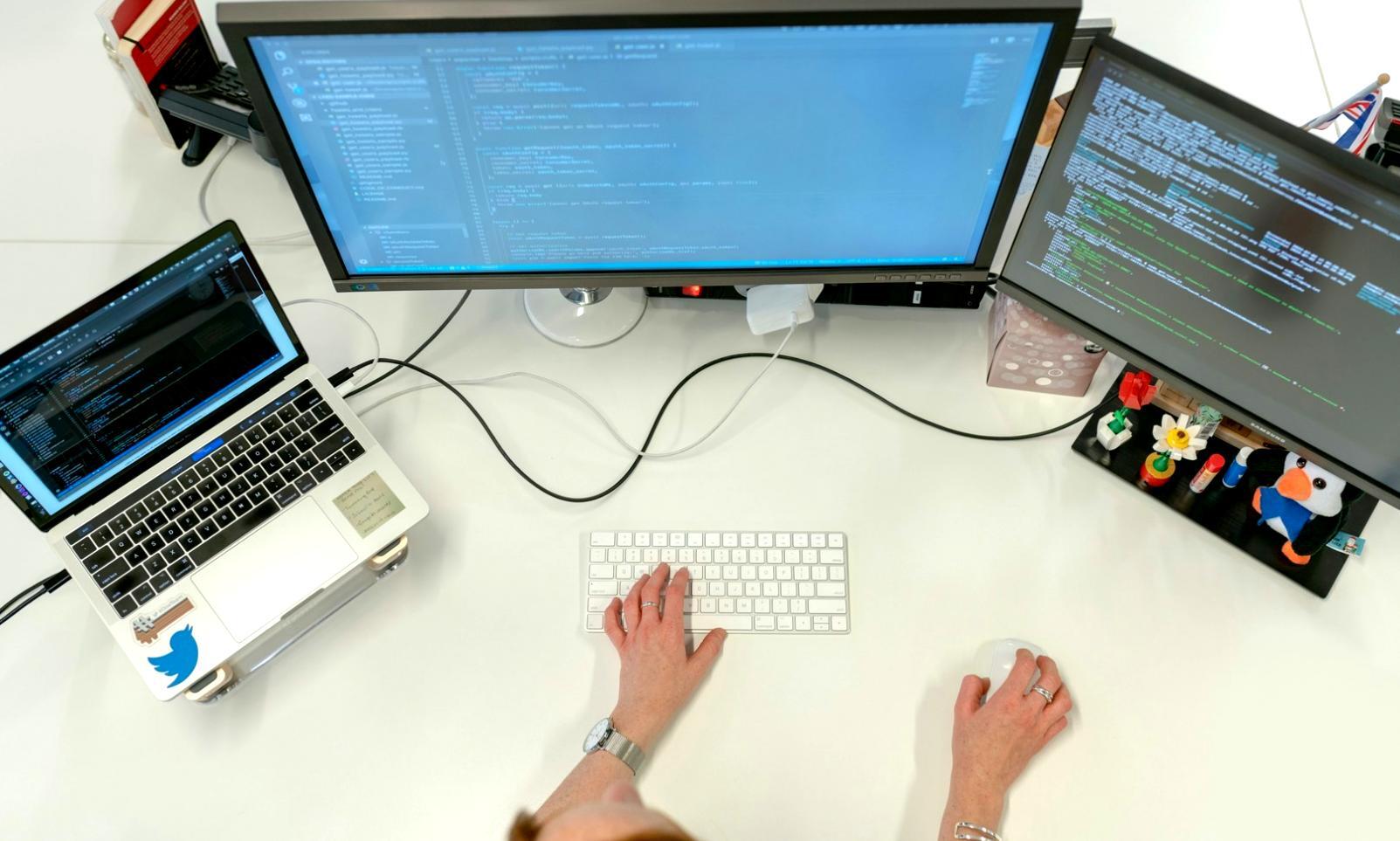 Professional 3D modeling workspace showing detailed character and environment assets in development